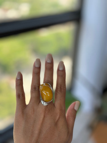 curve African amber ring
