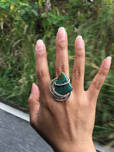 unique turquoise stone wire wrap in sterling silver for a beautiful ring