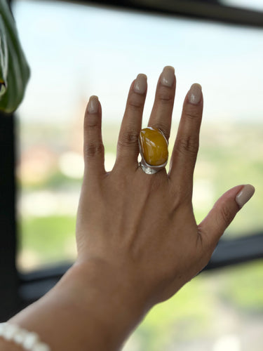 curve African amber ring