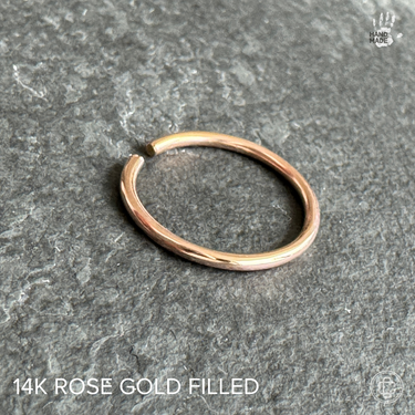 14k rose gold on a soft background