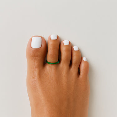Dark green anodized aluminum small toe ring on toes — smooth rounded fit, COLORS Collection by Clay & Chloe Jewelry.