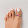 Hot pink anodized aluminum big toe ring on toes — smooth rounded fit, COLORS Collection by Clay & Chloe Jewelry.