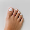 Hot pink anodized aluminum small toe ring on toes — smooth rounded fit, COLORS Collection by Clay & Chloe Jewelry.
