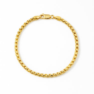 A 3.5mm 14K gold-filled round box chain bracelet with a high-polish finish and a secure lobster clasp, displayed against a light grey background.
