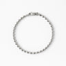 A 3mm sterling silver bracelet featuring elongated oval rice-shaped beads and a secure lobster clasp.
