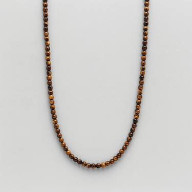 A single strand of 4mm golden-brown Tiger's Eye beads displayed in a U-shape against a neutral light grey background.
