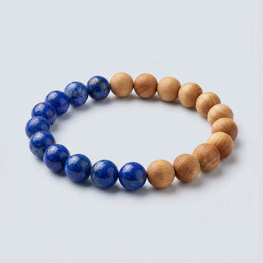 An 8mm stretch bracelet featuring a half-and-half design of deep blue Lapis Lazuli and warm Golden Sandalwood beads.

