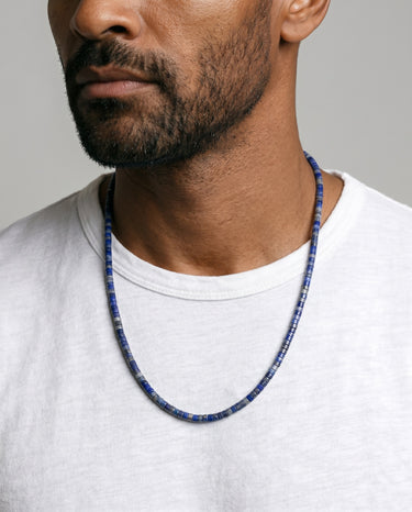 Minimalist men’s necklace featuring natural 4x2mm lapis lazuli heishi semi-precious stone beads.