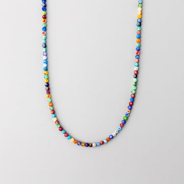 A multi-colored men's beaded necklace featuring 4mm Millefiori glass mosaic beads, displayed hanging in a U-shape against a plain white background.
