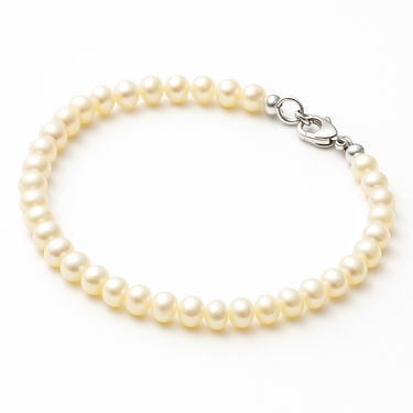 A perspective studio shot of the 4-5mm baroque pearl bracelet, highlighting the secure sterling silver lobster clasp and the delicate, high-quality craftsmanship.
