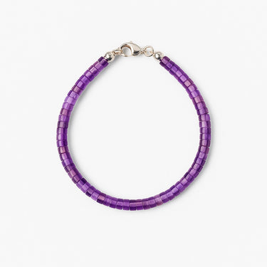 A studio hero shot of a women's 4mm natural amethyst heishi bead bracelet with a sterling silver lobster clasp, showcasing the vibrant purple gemstone tones and refined, uniform disk shape.

