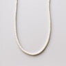A professional studio hero shot of the women's 4mm white turquoise heishi necklace arranged in a U-shape against a neutral background, highlighting the uniform disc shape and crisp white color.
