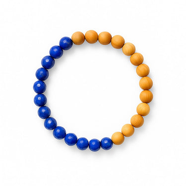 A top-down studio shot of the 8mm lapis lazuli and sandalwood bracelet, showcasing the balanced half-and-half design and uniform round beads.
