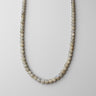 6mm labradorite bead necklace featuring natural gray gemstone beads arranged in a U-shape on a white background.