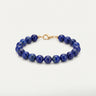 A studio hero shot of a women's 8mm natural lapis lazuli bead bracelet with a 14K gold-filled lobster clasp, highlighting the deep royal blue gemstone tones and high-polish finish.