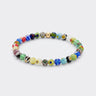A studio product shot of a women's 6mm colorful millefiori glass bead bracelet featuring a single 14K gold-filled accent bead.