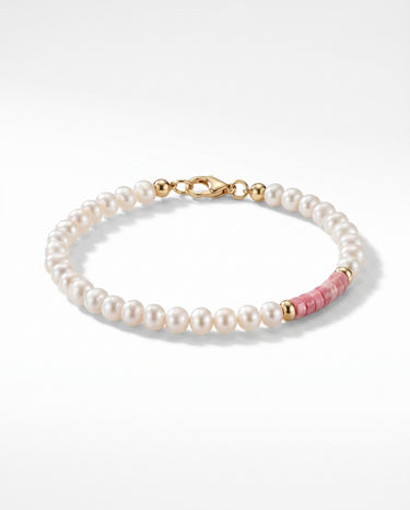 A studio product shot of a women's 4mm natural pearl and rhodonite bead bracelet with a 14K gold-filled clasp, featuring high-luster pearls accented by soft pink gemstone tones.