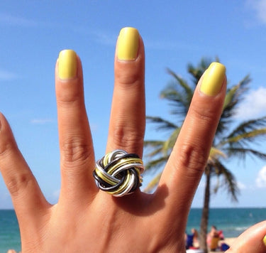 Black, light green, and silver color anodized aluminum wire wrap ring.