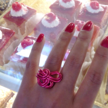 Red color anodized aluminum wire wrap ring.