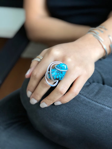 Front view of Phuket Turquoise Wave Ring with hammered sterling silver wire-wrapped setting